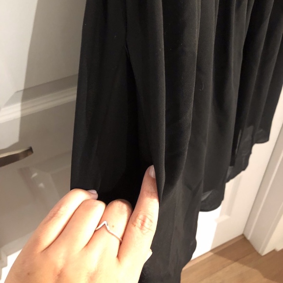 Black sleeveless dress with pockets - Picture 2 of 7